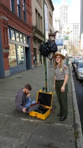 Jean, KG7NJQ, works the pile with Ranger Tarin looking on.